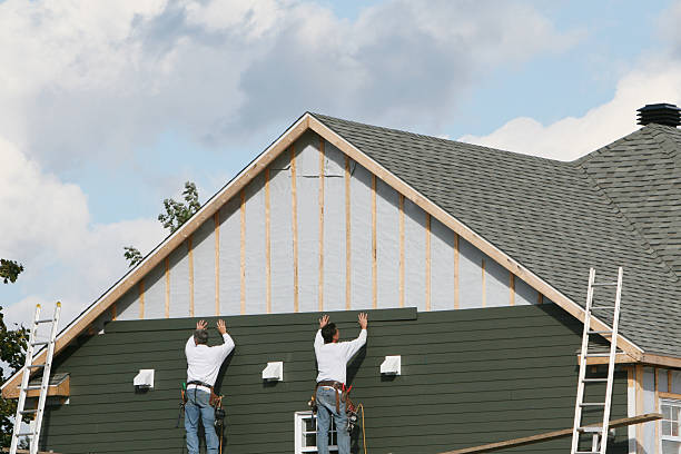Professional Siding technician working in Colliers, WV